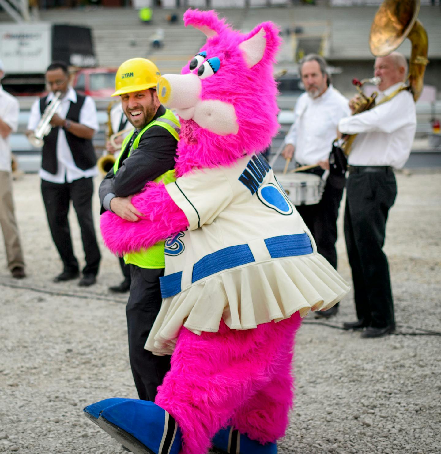 Mudonna danced with Saints media relations director Sean Aronson at the start. At a ceremony today at the stadium construction site, St. Paul and St. Paul Saints leaders announced the name of the new field will be CHS Field. CHS Inc is the nations leading farmer-owned cooperative and a global energy, grains and foods company. Team mascot Mudonna was also on hand with a band. ] St. Paul , MN -- , Monday, September 8, 2014. GLEN STUBBE * gstubbe@startribune.com