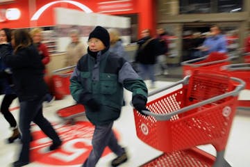 Roseville, Mn. Friday 11/26/10 Black Friday early shopping. These people waited in line for hours in below zero windchill to shop for bargains at the 