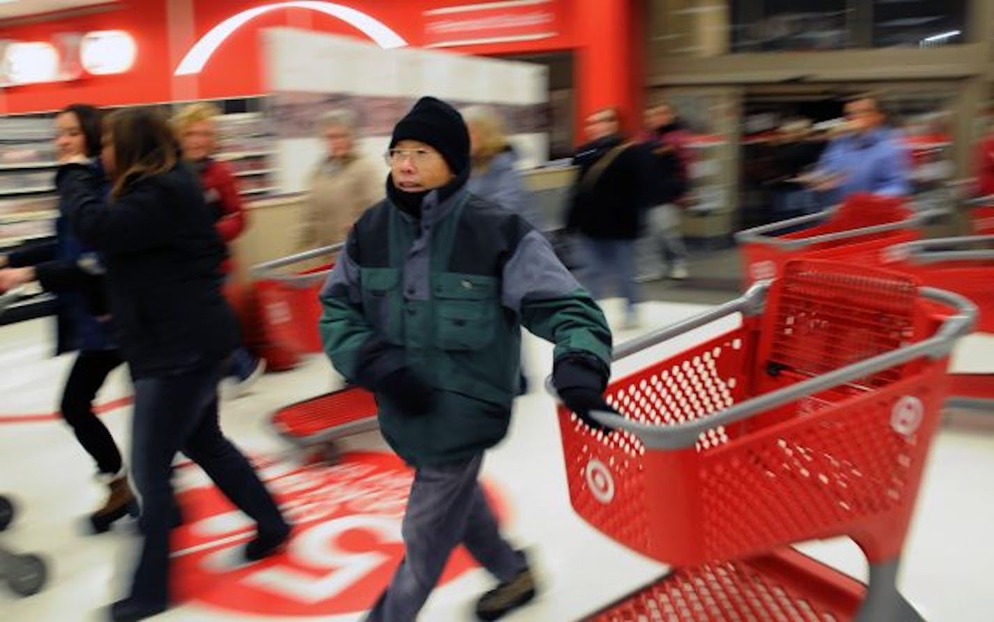 Roseville, Mn. Friday 11/26/10 Black Friday early shopping. These people waited in line for hours in below zero windchill to shop for bargains at the Target store in Roseville, MN. This year, the store will open at midnight.