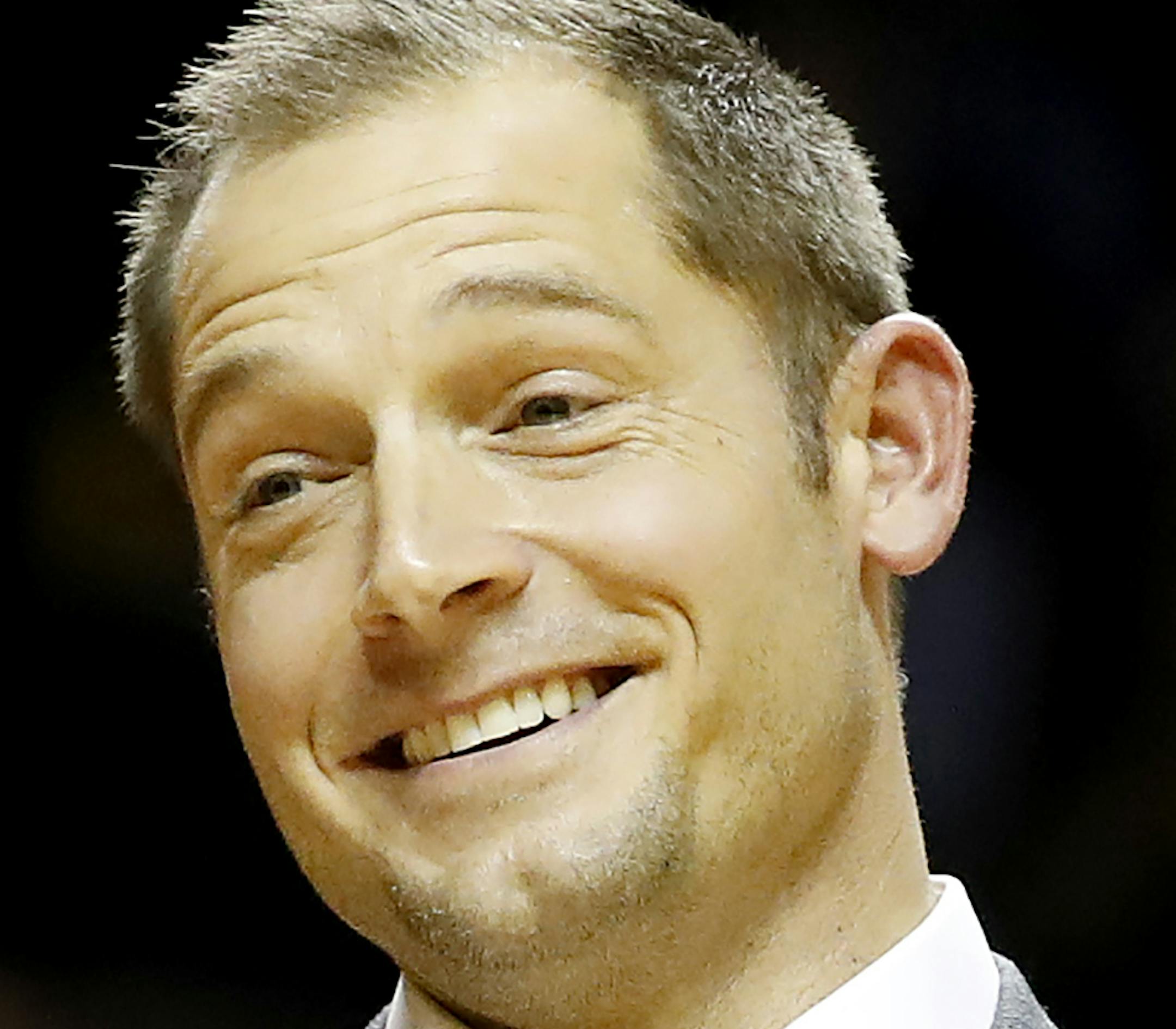 Minnesota Gophers head football coach P.J. Fleck addresses the crowd and helped the half time entertainment act Red Panda at William Arena. ] CARLOS GONZALEZ cgonzalez@startribune.com - January 8, 2017, Minneapolis, MN, Williams Arena, NCAA Basketball, University of Minnesota Gophers vs. Ohio State Buckeyes