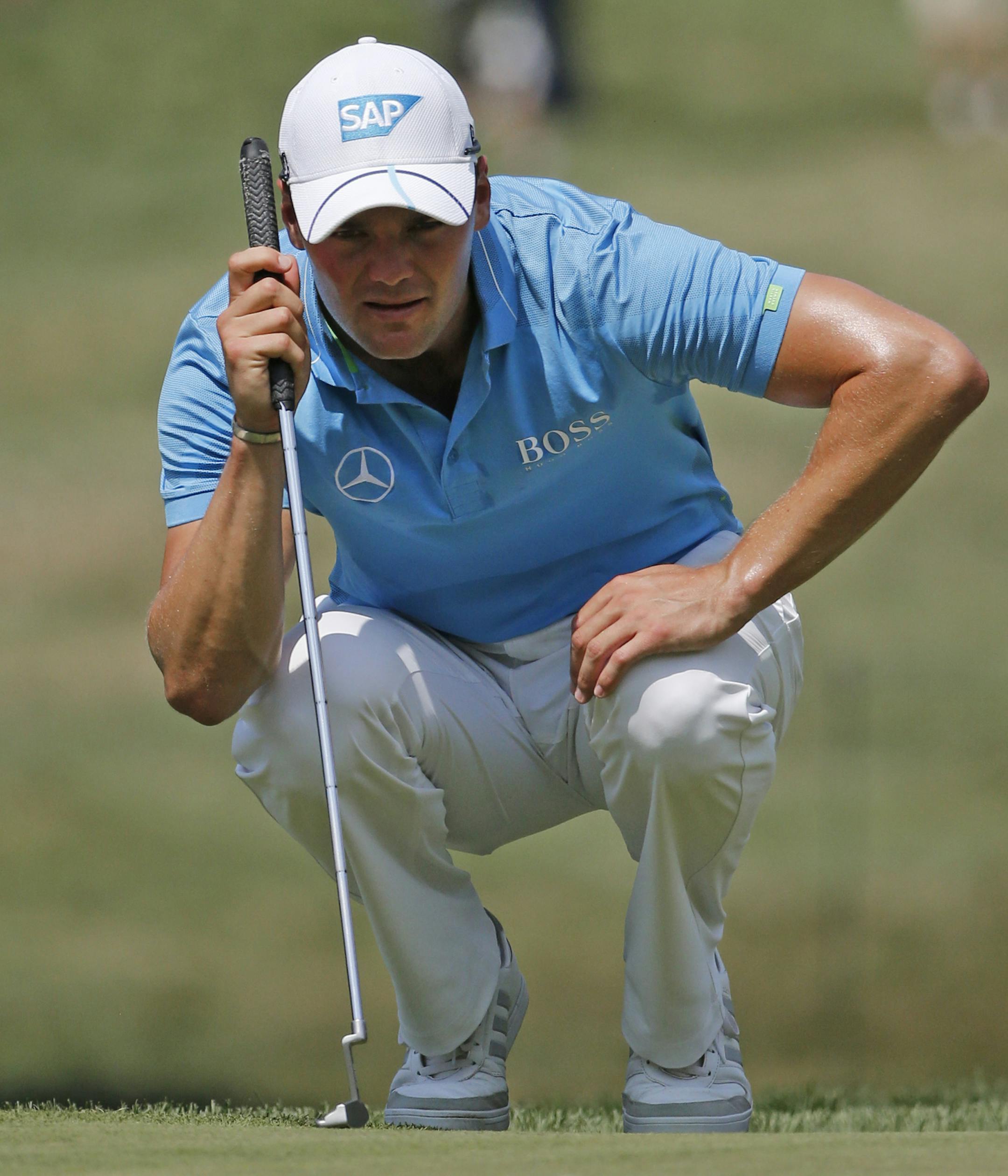 Martin Kaymer lines up a putt on the 15th hole during the first round of the PGA Championship golf tournament at Baltusrol Golf Club in Springfield, N.J., Thursday, July 28, 2016. (AP Photo/Mike Groll)