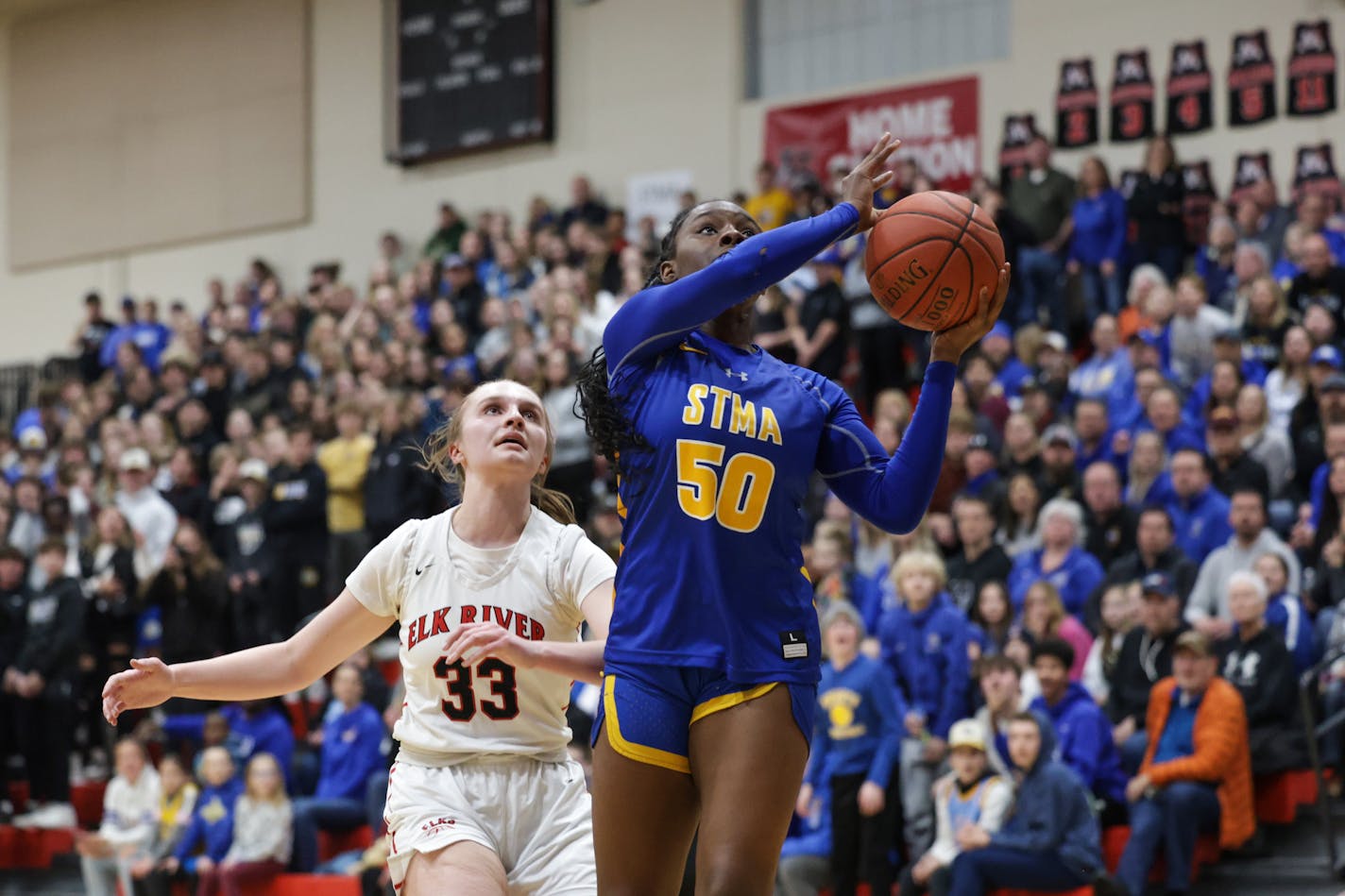 St. Michael-Albertville's Ja'Kahla Craft (50) scored 16 first half points. Photo by Cheryl A. Myers, SportsEngine