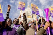 SEIU members, janitors, nursing home workers, the Minnesota Nurses Association, join to rally outside the State Capitol during their Strike in St. Pau