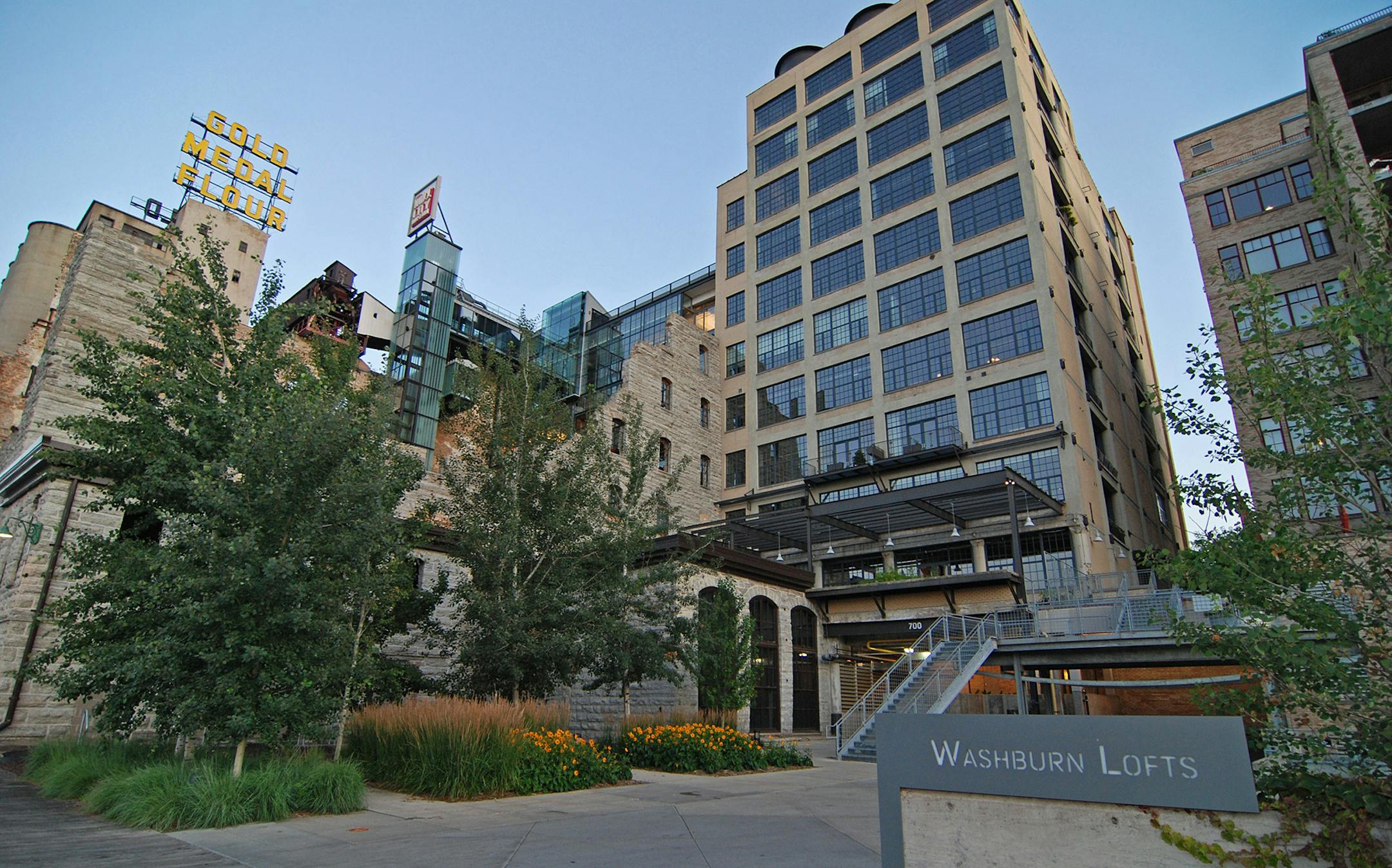 The Washburn unit has a full-on view of the entire length of the Stone Arch Bridge and St. Anthony Falls, a private elevator and its own manicured lawn.
