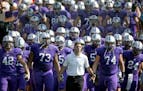 In this Sept. 27, 2014, file photo, St. Thomas coach Glen Caruso leads his team onto the field