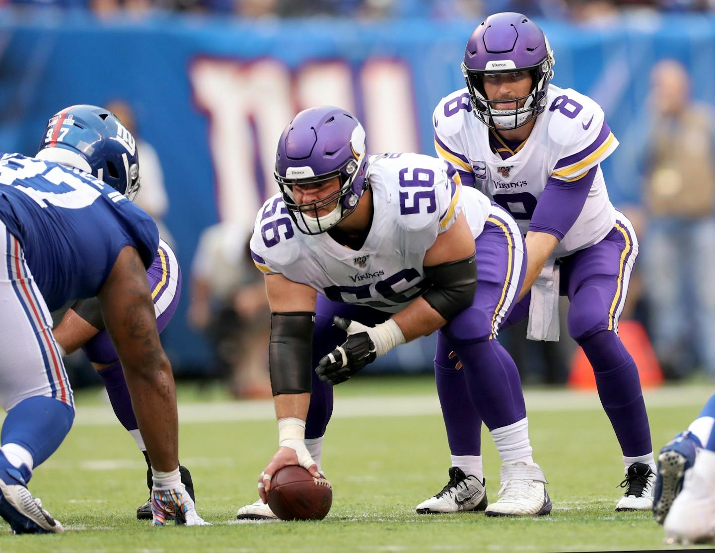 Minnesota Vikings quarterback Kirk Cousins (8) and center Garrett Bradbury (56).