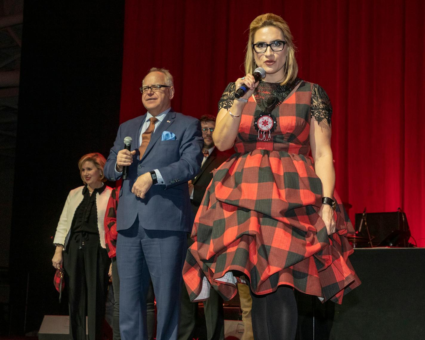 Gov. Tim Walz and Lt. Gov. Peggy Flanagan at the One Minnesota party. Flanagan's dress was designed by former "Project Runway" contestant Samantha Rei of Minneapolis.