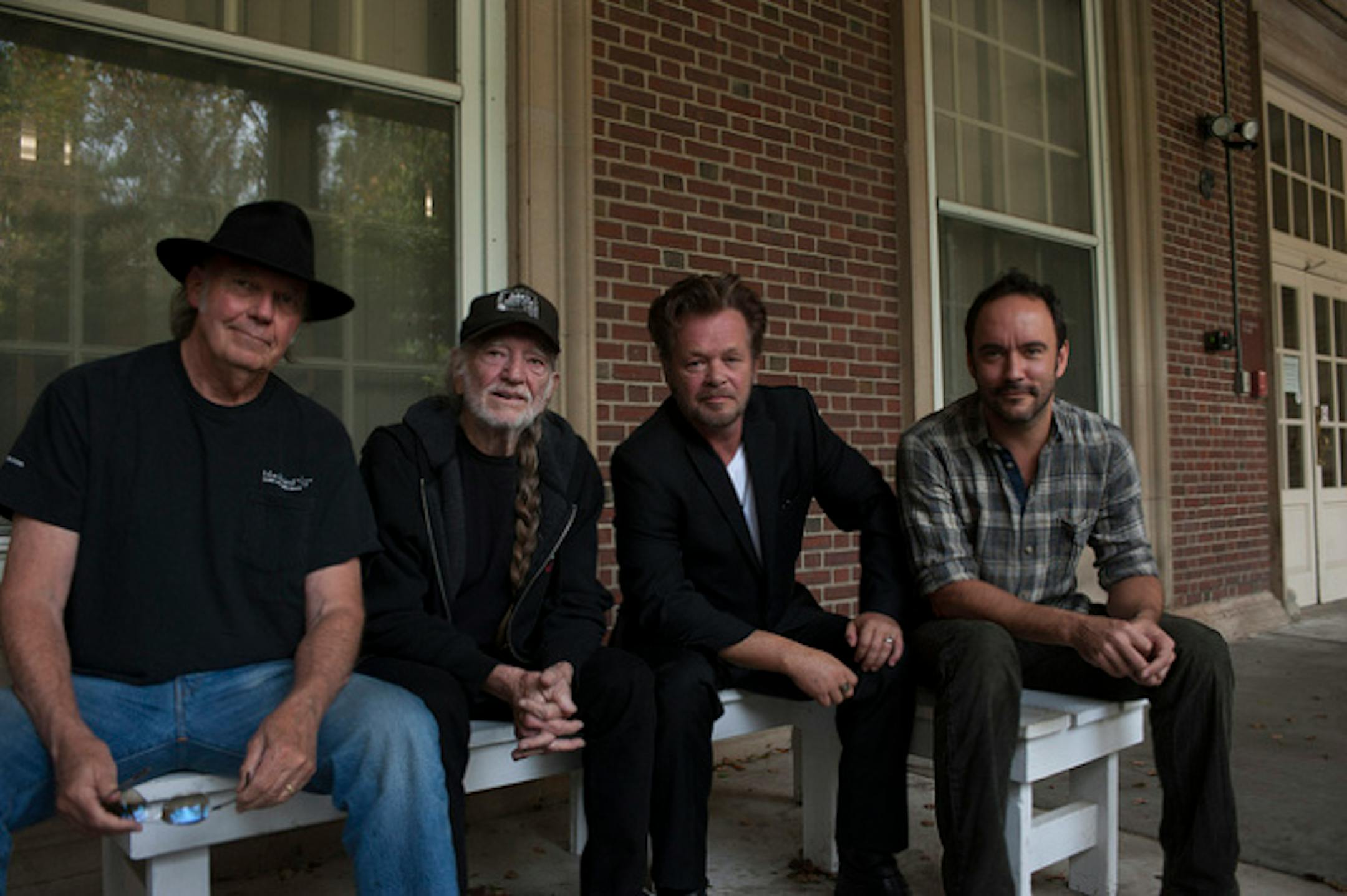The Farm Aid Four: Neil Young, Willie Nelson, John Mellencamp and Dave Matthews. / Paul Natkin/Photo Reserve, Inc.