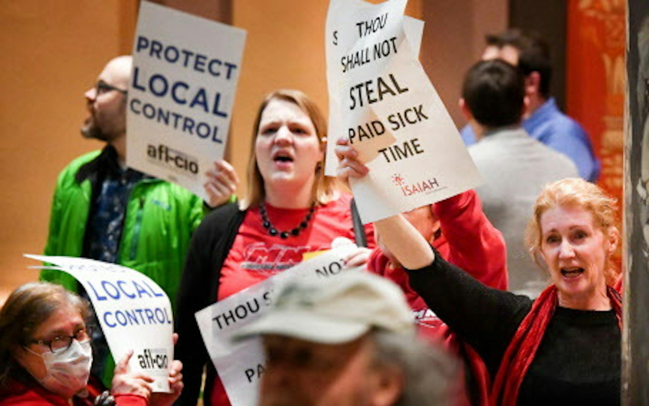 A coalition of groups including Main Street Alliance, TakeAction Minnesota, Neighborhoods Organizing for Change (NOC), SEIU Minnesota, AFL-CIO, and ISAIAH protested the preemption bill outside the Senate Chamber Thursday morning. ] GLEN STUBBE ï glen.stubbe@startribune.com Thursday April 20, 2017 Minnesota Senate votes Thursday on the bill that would prevent cities from mandating sick leave or setting a minimum wage. A coalition of groups including Main Street Alliance, TakeAction Minnesota