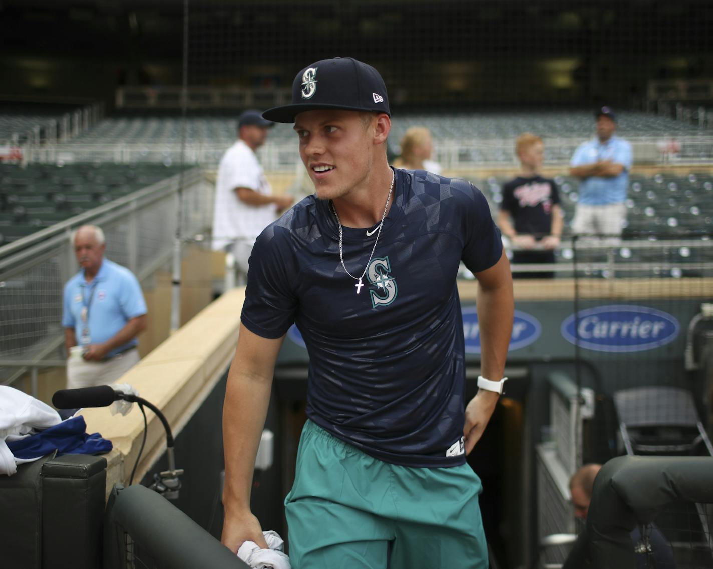 After changing into some Mariners gear, Burnsville's Sam Carlson spent time with the team before Tuesday's game at Target Field. (Jeff Wheeler, Star Tribune)