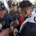 Byron Buxton of the Twins signed autographs on Saturday in Fort Myers, Fla.