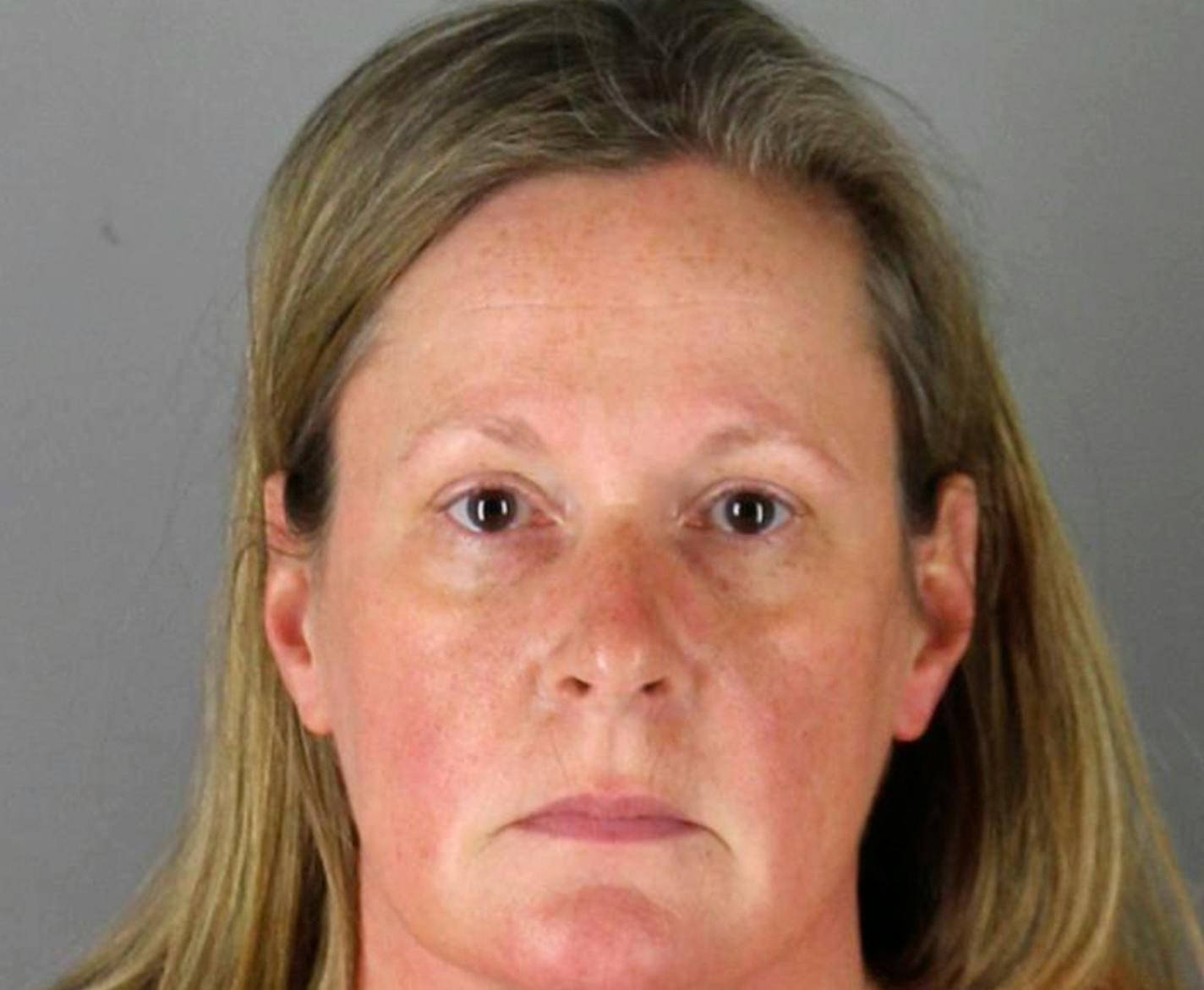 This booking photo released by the Hennepin County, Minn., Sheriff shows Kim Potter, a former Brooklyn Center, Minn., police officer who is charged Wednesday, April 14, 2021, with second-degree manslaughter for killing 20-year-old Black motorist Daunte Wright in a shooting that ignited days of unrest and clashes between protesters and police. (Hennepin County Sheriff via AP)