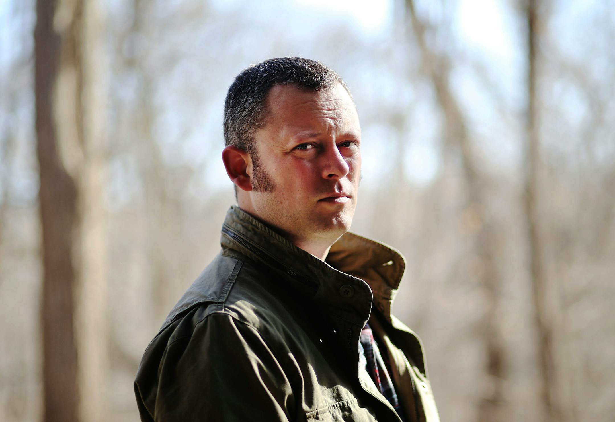 Author Benjamin Percy, outside his Northfield home.