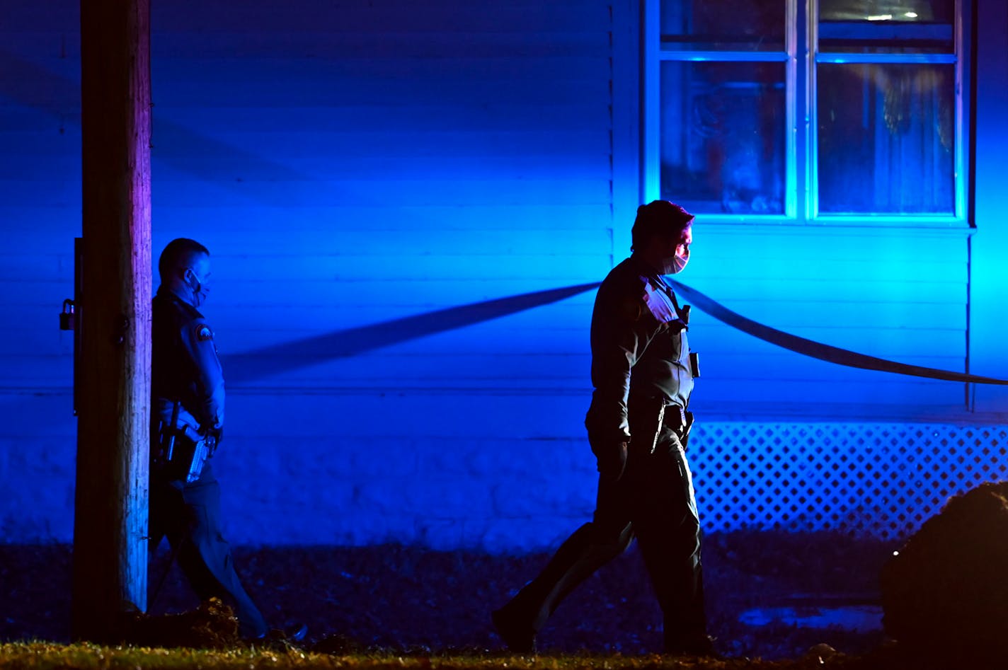 Saint Paul Police officers walked near the scene of an earlier shooting in which Saint Paul Police shot a person near Rice Street and Magnolia.