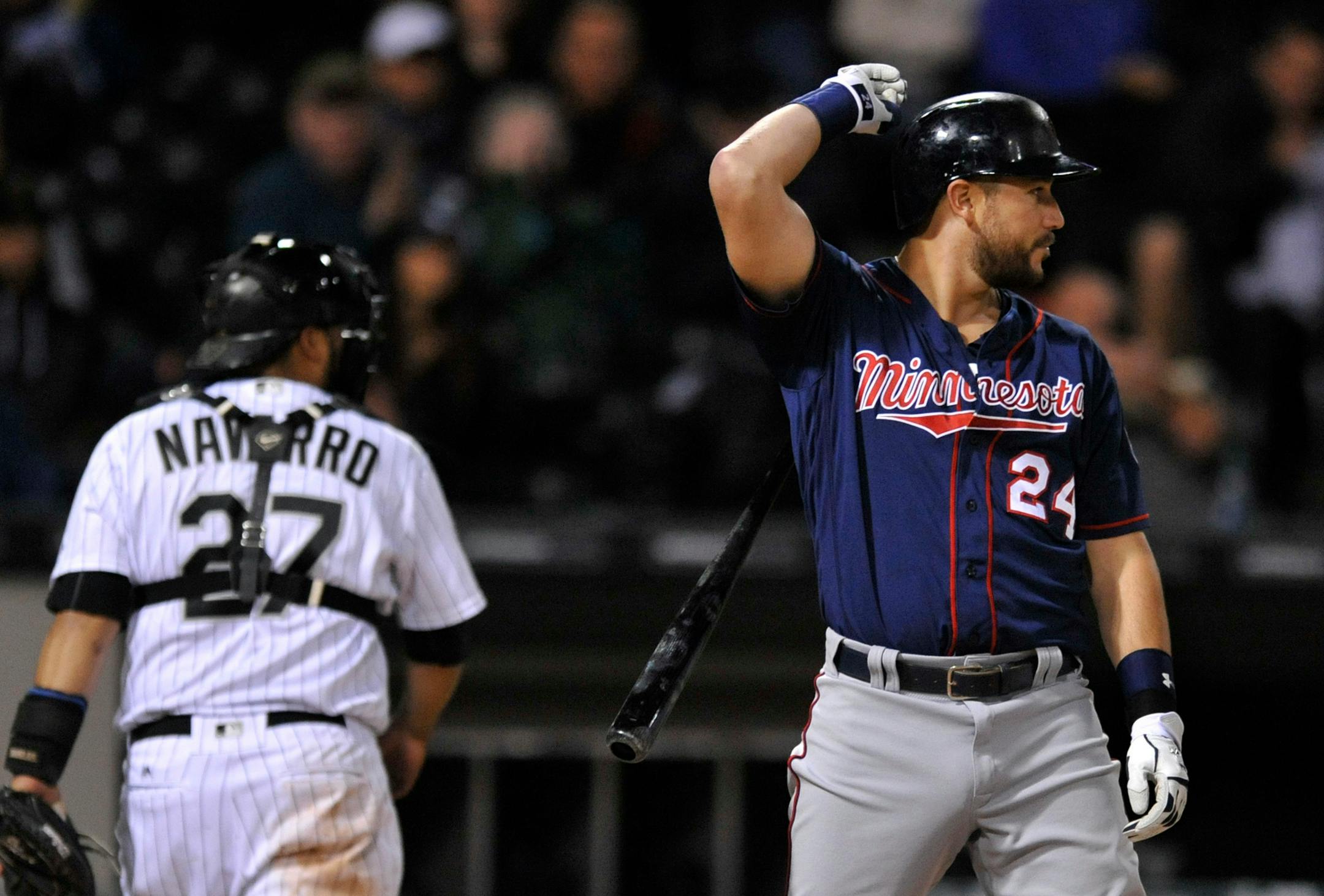 Minnesota Twins' Trevor Plouffe, 24, reacts after striking out during the eighth inning of a baseball game against the Chicago White Sox, Saturday, May 7, 2016, in Chicago. (AP Photo/Paul Beaty) ORG XMIT: MIN2016050721233024
