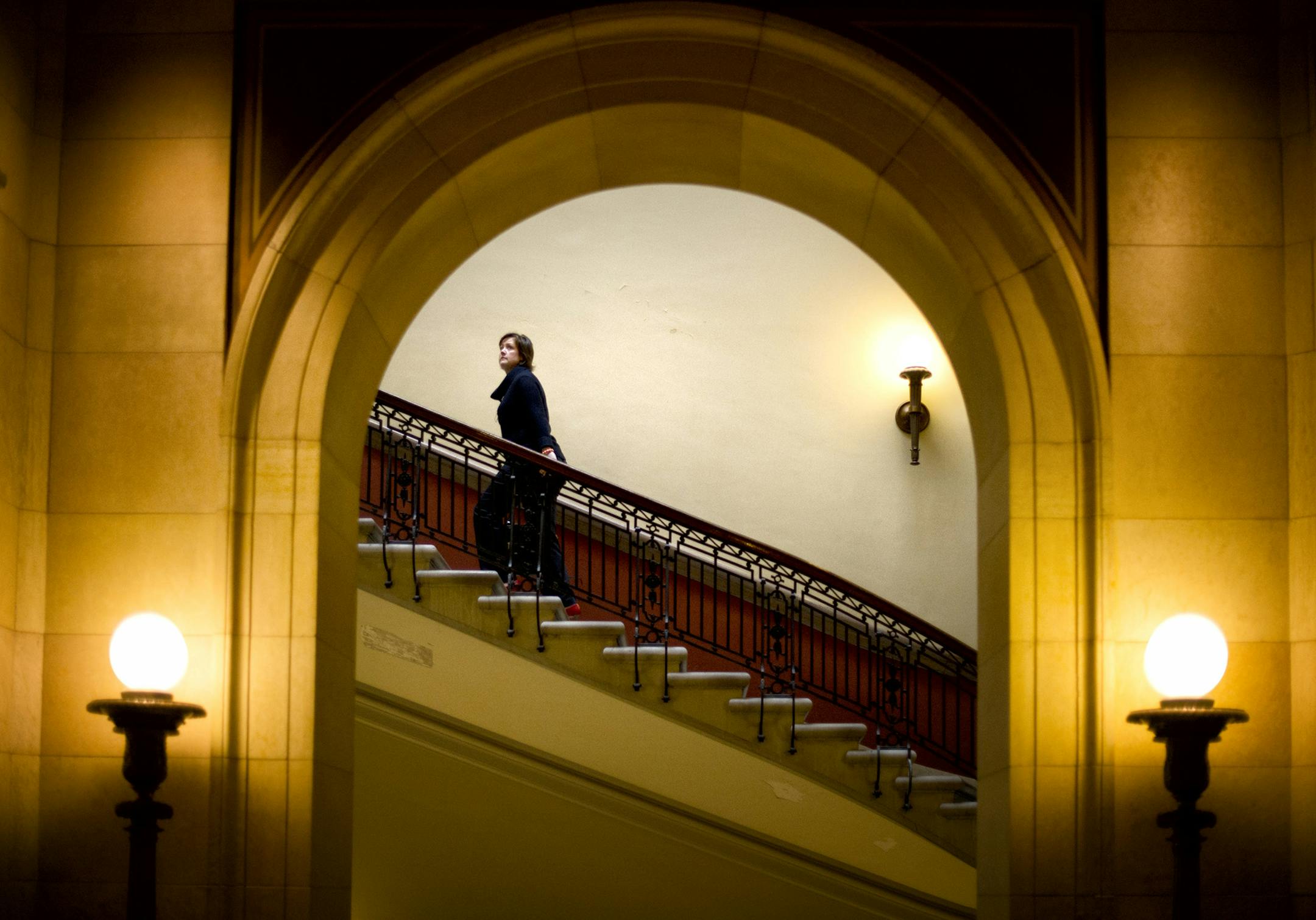 Mayo Clinic lead lobbyist Erin Sexton headed up to listen to HHS debate in the House Gallery at the State Capitol in St. Paul. Monday, April 22, 2013 ] GLEN STUBBE * gstubbe@startribune.com