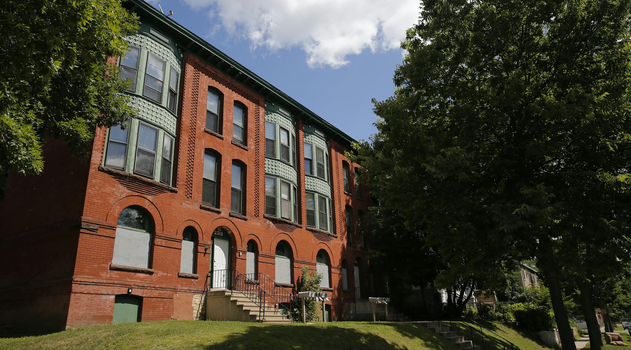 The Euclid Flats property in St. Paul has a long history and a great setting. Sand Companies Inc. hopes to convert it into a 12-unit residential complex.