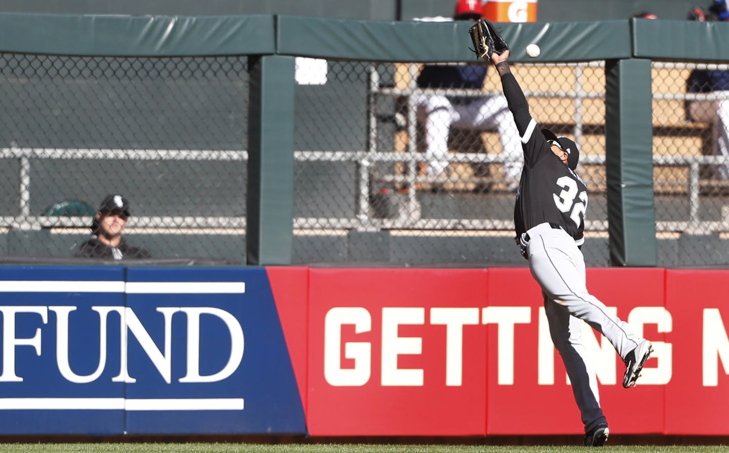 Chicago White Sox center fielder Jacob May missed a Minnesota Twins second baseman Brian Dozier (2) fly ball in the fifth inning at Target Field.