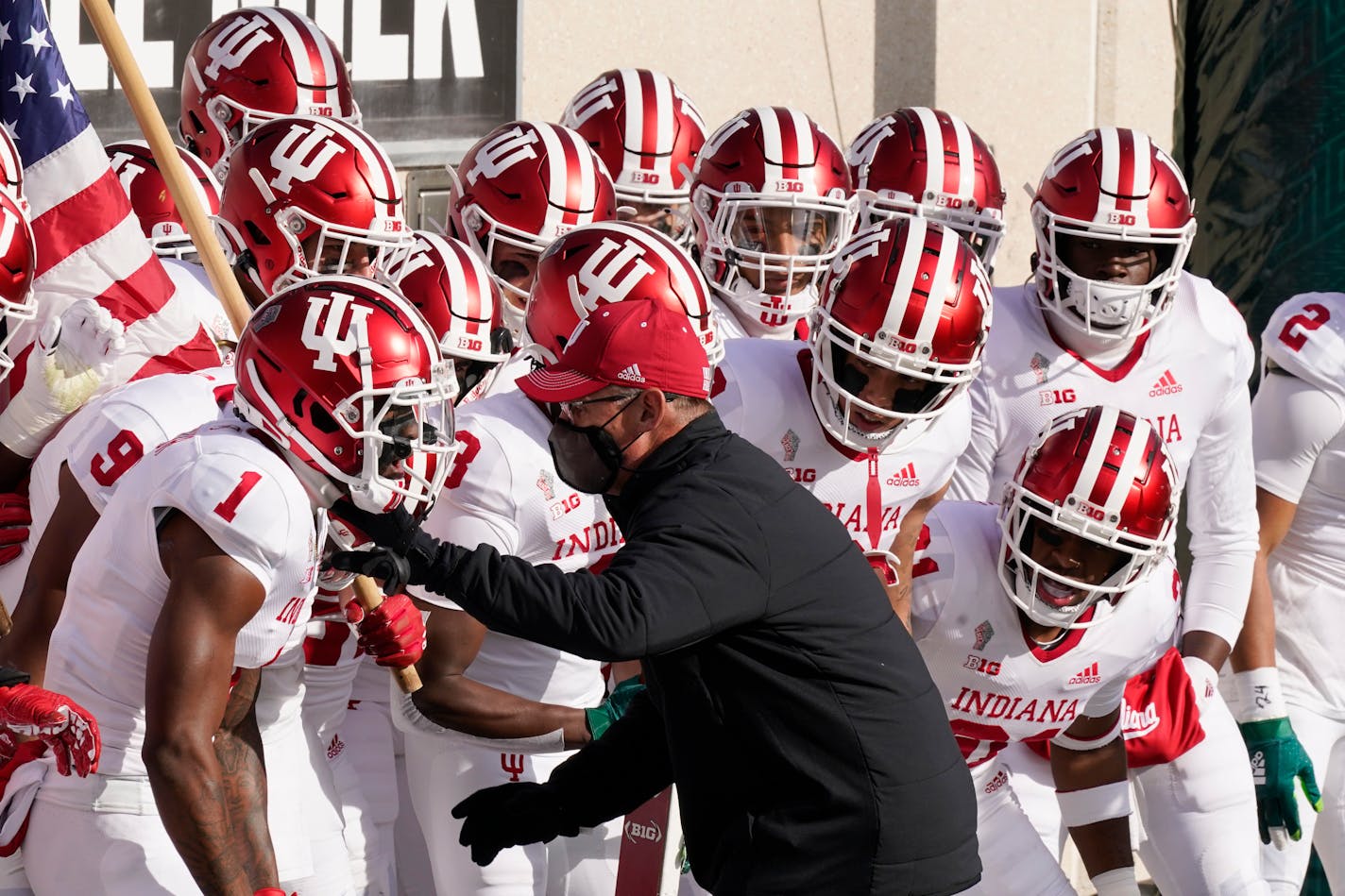 Indiana head coach Tom Allen fires ups his team before the first half of an NCAA college football game against Michigan State, Saturday, Nov. 14, 2020, in East Lansing, Mich. (AP Photo/Carlos Osorio)