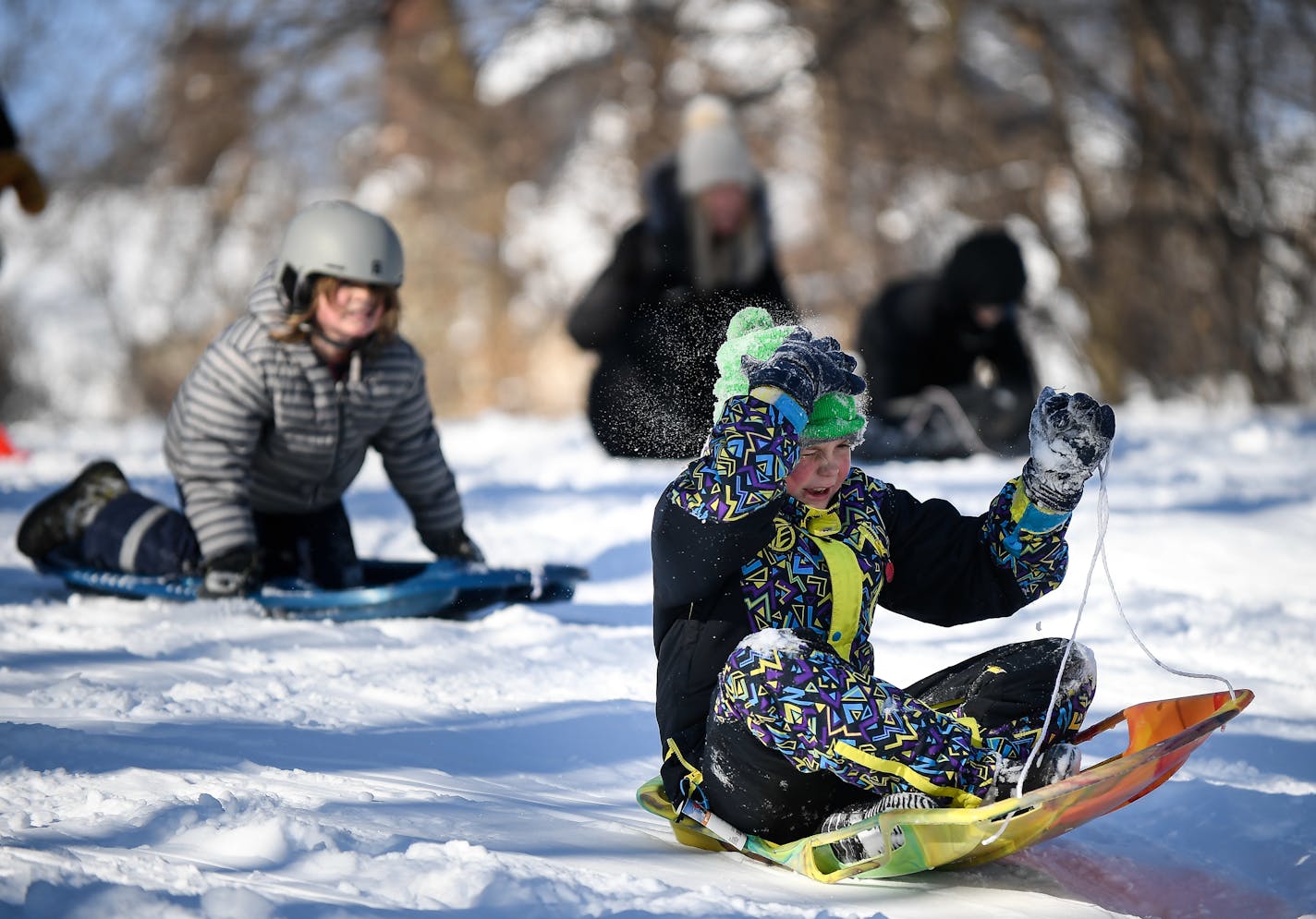 Sledders went down the hill at Beard's Plaisance Tuesday morning.