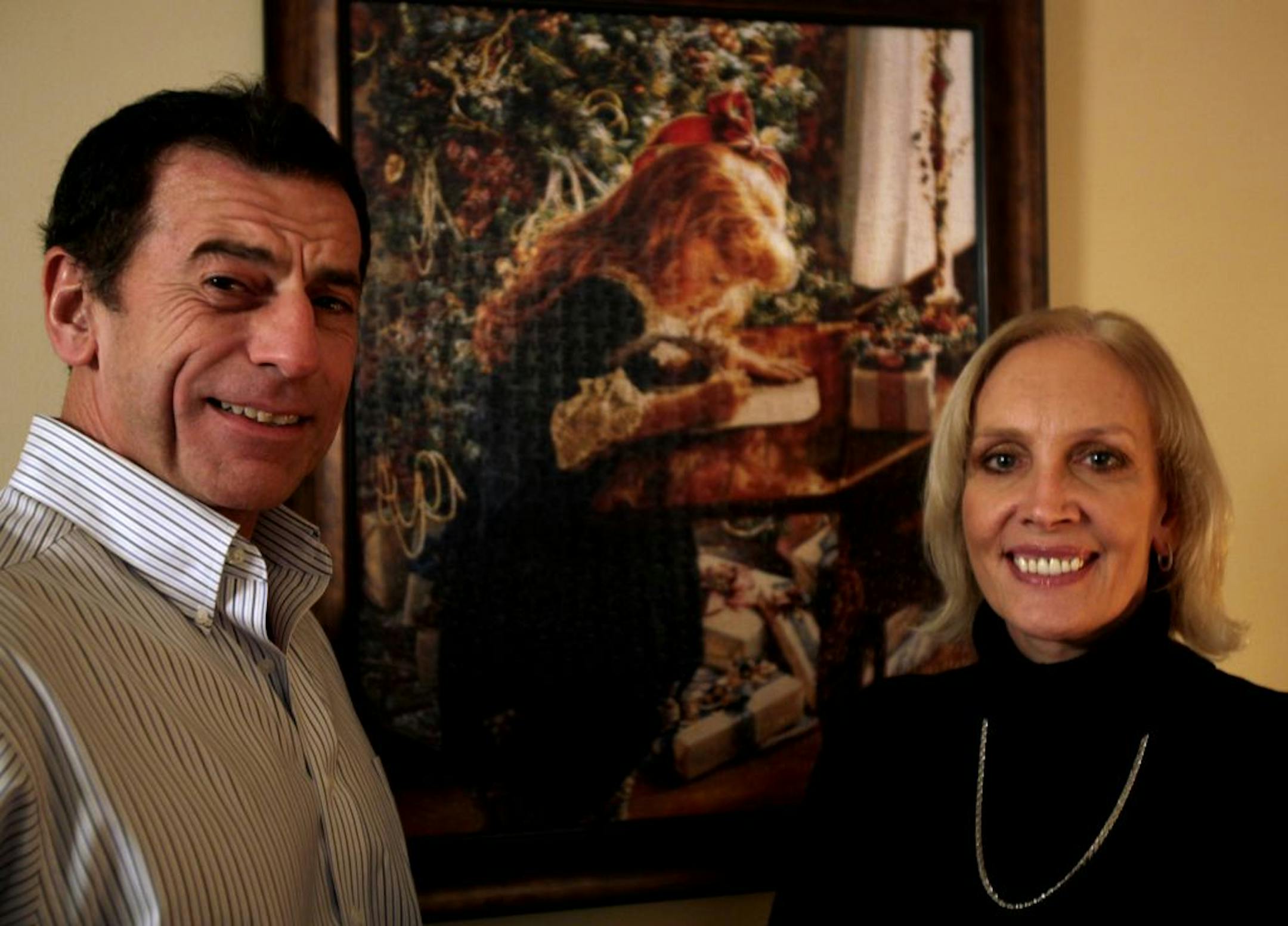 Patti Tannuzzo's favorite puzzle, "Letter to Santa," holds a place of honor above the sofa table. Her husband, Tom, started the puzzle-giving tradition years ago.