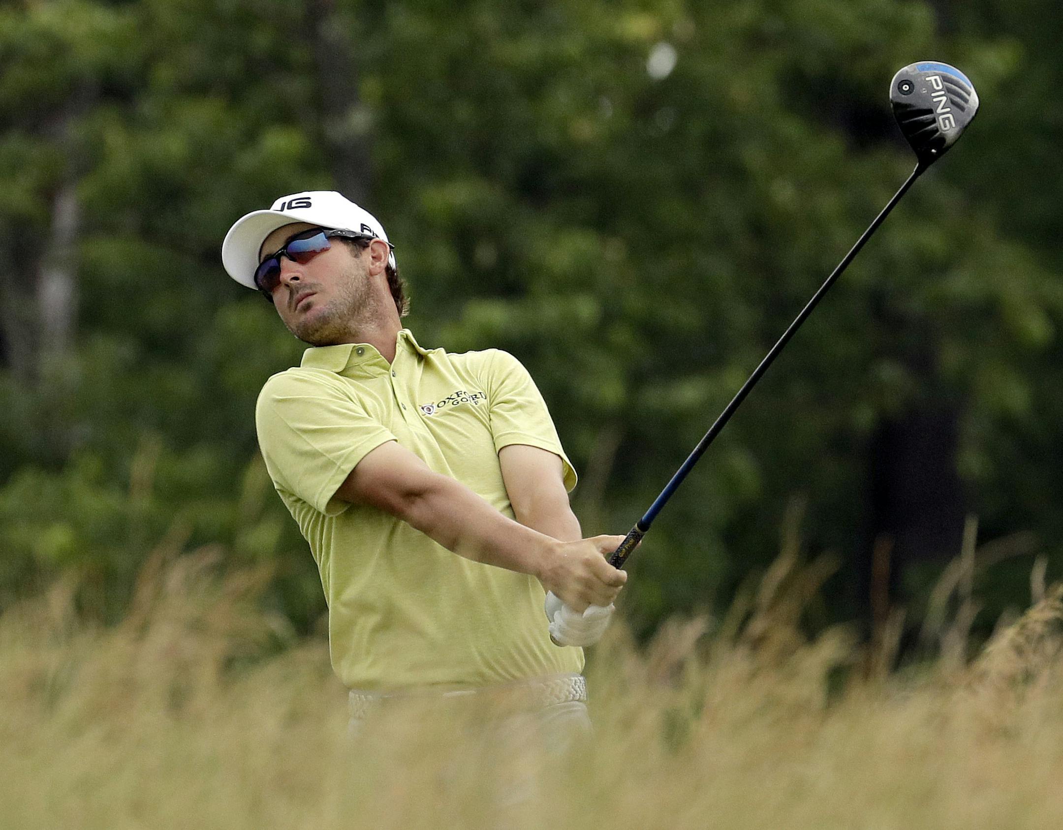 Andrew Landry watches his tee shot fourth tee during the first round of the U.S. Open golf championship at Oakmont Country Club on Thursday, June 16, 2016, in Oakmont, Pa. (AP Photo/Charlie Riedel)