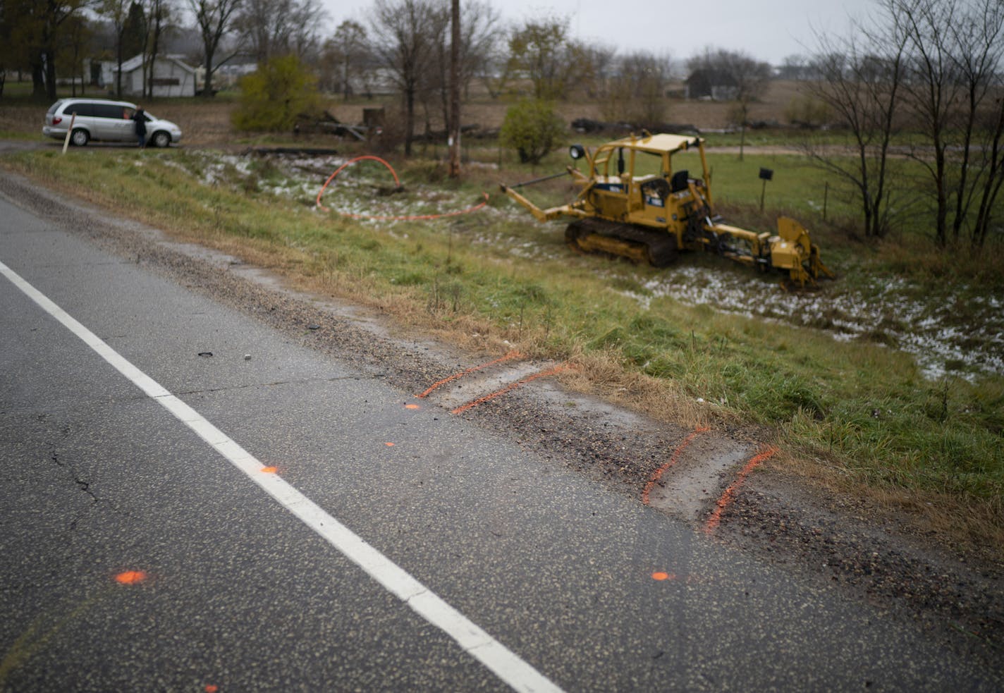 Tire tracks marked with spray paint where the vehicle that struck three Girl Scouts and an an adult chaperone climbed out of the ditch to get back on Wisconsin County Hwy. P. ] JEFF WHEELER &#xef; jeff.wheeler@startribune.com The scene on Sunday afternoon, November 4, 2018 where three girls scouts and a chaperone were struck and killed by a hit and run driver on Wisconsin County Hwy. P in Lake Hallie, outside Chippewa Falls, WI on Saturday morning.