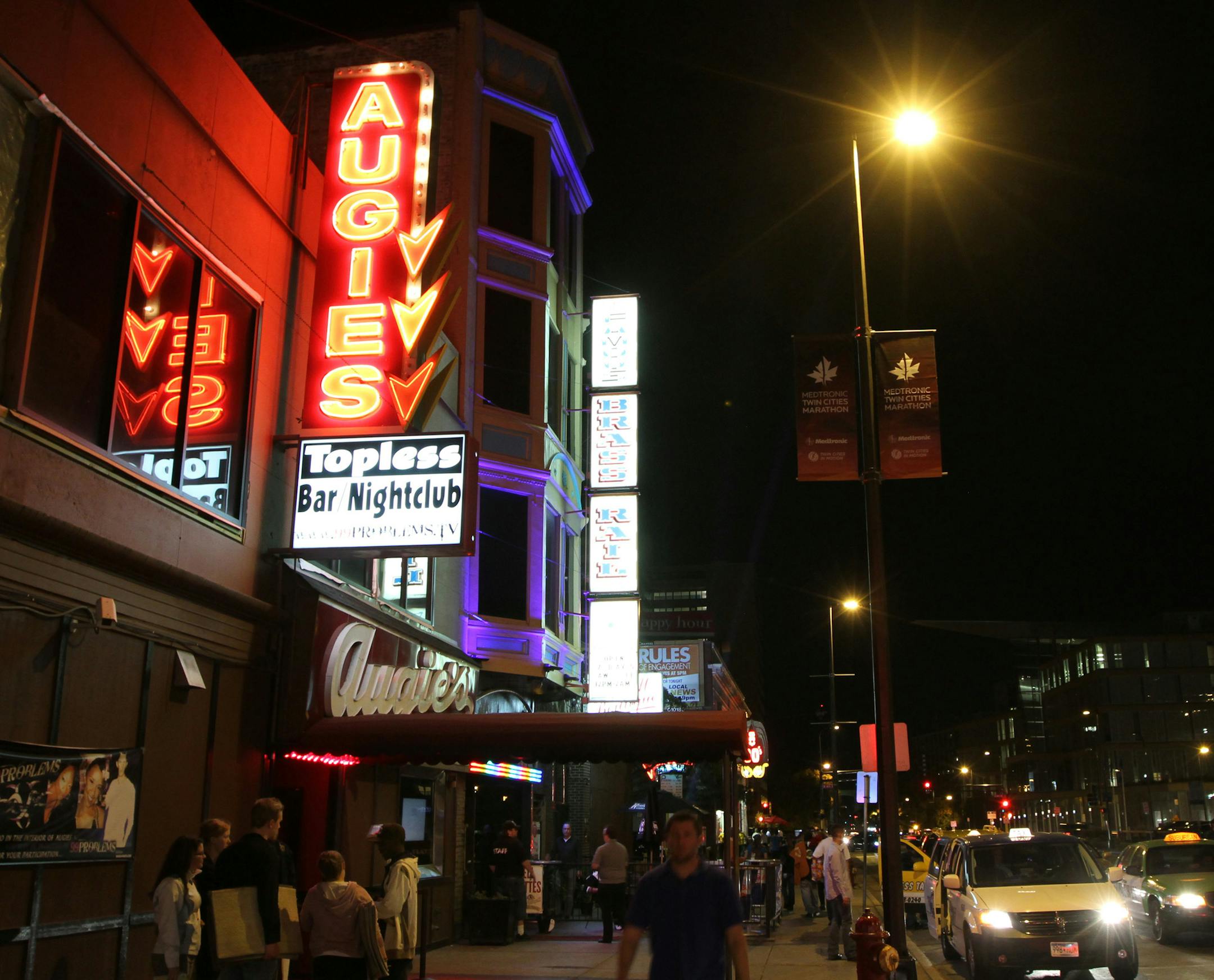 To most outsiders, Augie's in downtown Minneapolis is a notorious, tough-as-nails strip club. While all of that is true, the story behind its owner and his clientele is much more complicated. So compelling that TV producers are interested in filming a reality show about owner Brian Michael and the various characters that populate this action-packed club.] Bruce Bisping/Star Tribune bbisping@startribune.com Brian Michael/source.