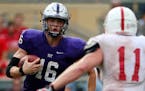 University of St. Thomas quarterback Jacques Perra (16) ran the ball in the second half. ] ANTHONY SOUFFLE &#xef; anthony.souffle@startribune.com Game