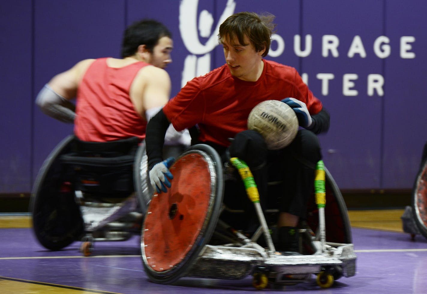 Kyle Peterson, of Moose Lake, drives four hours round trip to the cities a couple times a week to play quad rugby. &#x201a;&#xc4;&#xfa;Kyle&#x201a;&#xc4;&#xf4;s our long trekker,&#x201a;&#xc4;&#xf9; said Chuck Aoki, to the left of Peterson. Photo by Liz Rolfsmeier, Special to the Star Tribune