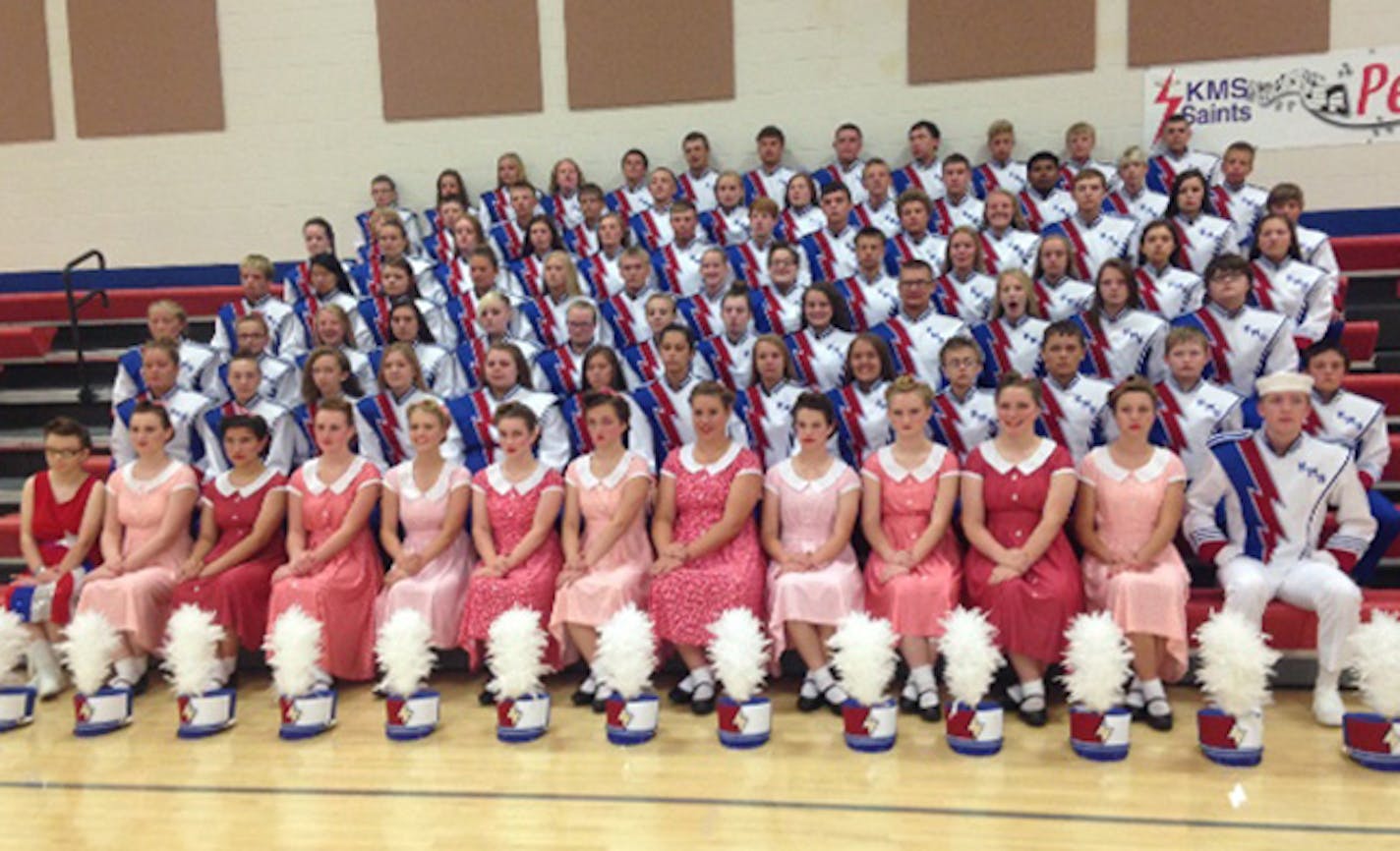 Band members designed parade performances on the WWII theme of "Heroes," with flag bearers wearing 1940s-inspired dresses and curls and including re-enactments of the flag raising at Iwo Jima.