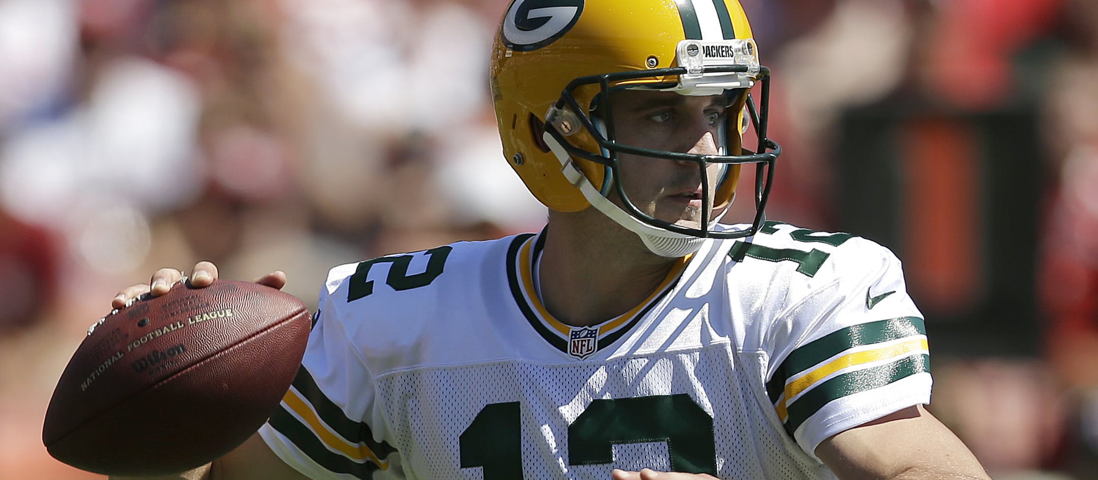 Green Bay Packers quarterback Aaron Rodgers (12) passes against the San Francisco 49ers during the first quarter of an NFL football game, Sunday, Sept. 8, 2013, in San Francisco. (AP Photo/Marcio Jose Sanchez) ORG XMIT: FXP112