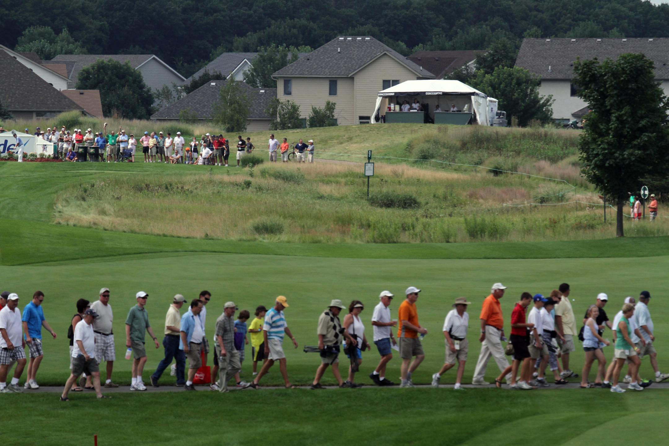 Fans snaked through the course, as they followed the golfers during the 3M Championship, Friday, August 5th, 2011 in Blaine MN.] Bruce Bisping/Star Tribune.
