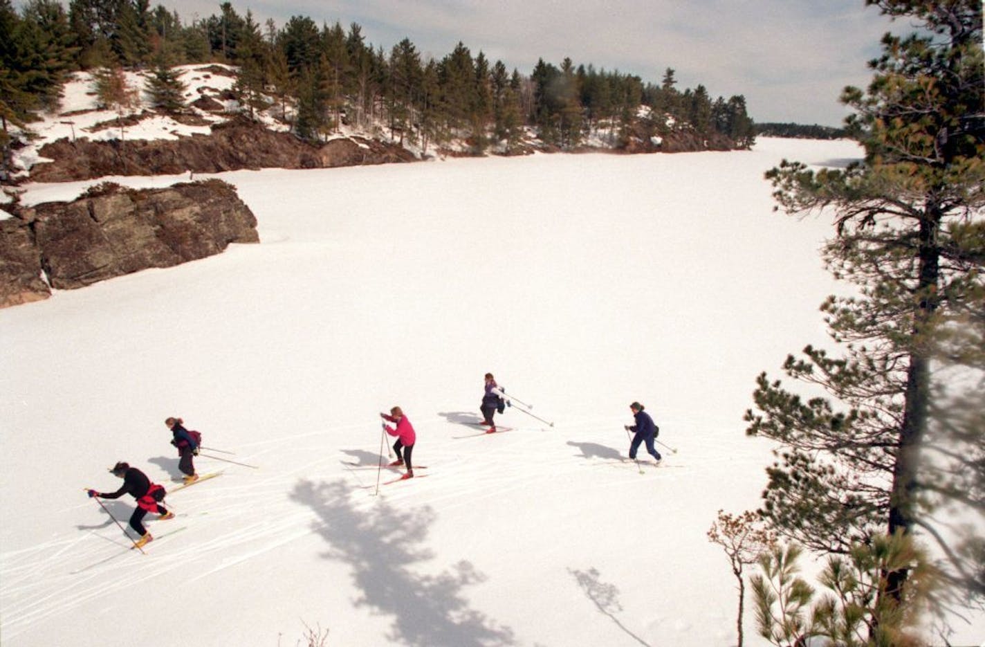 Skate ski enthusiasts on Burnside Lake near Ely, Minn.