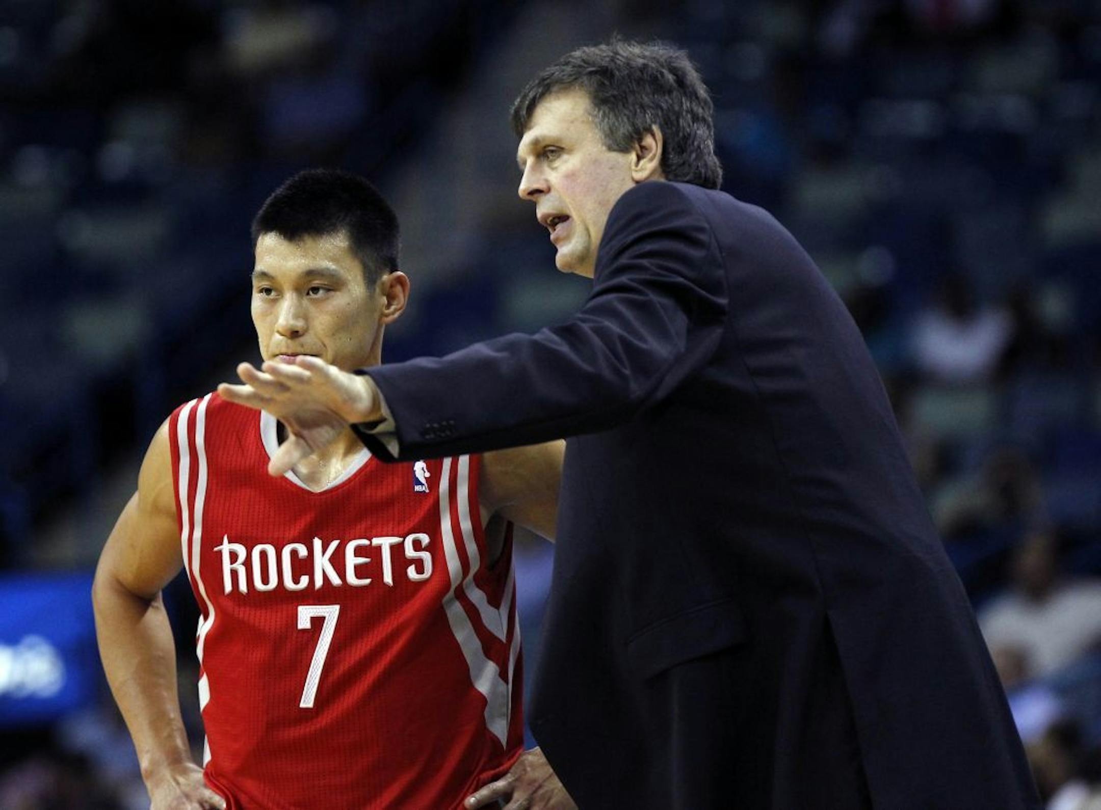 Houston Rockets head coach Kevin McHale, right, talks to point guard Jeremy Lin