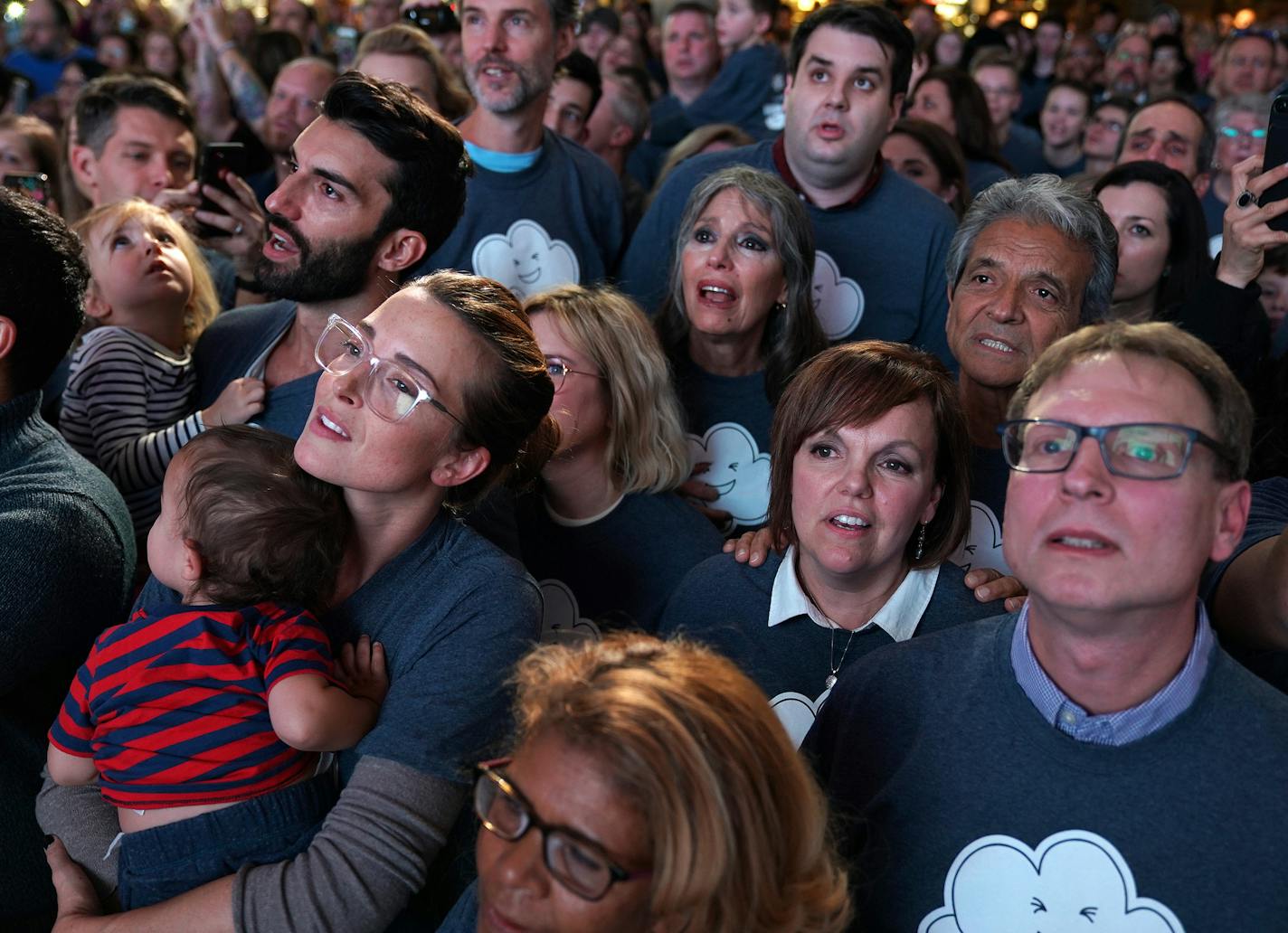 Laura and Rob Sobiech, right, stood with their family as they sang Clouds in honor of their son Zach Friday evening at the Mall of America.] ANTHONY SOUFFLE &#xef; anthony.souffle@startribune.com School choirs, churches choirs, groups and families sang and raised funds for the KS95 for Kids Radiothon, an annual fundraiser benefiting Children's Cancer Research Fund and Gillette Children's Specialty Healthcare, during the 6th annual "Clouds' Choir for a Cause performance Friday, Dec. 14, 2018 at t