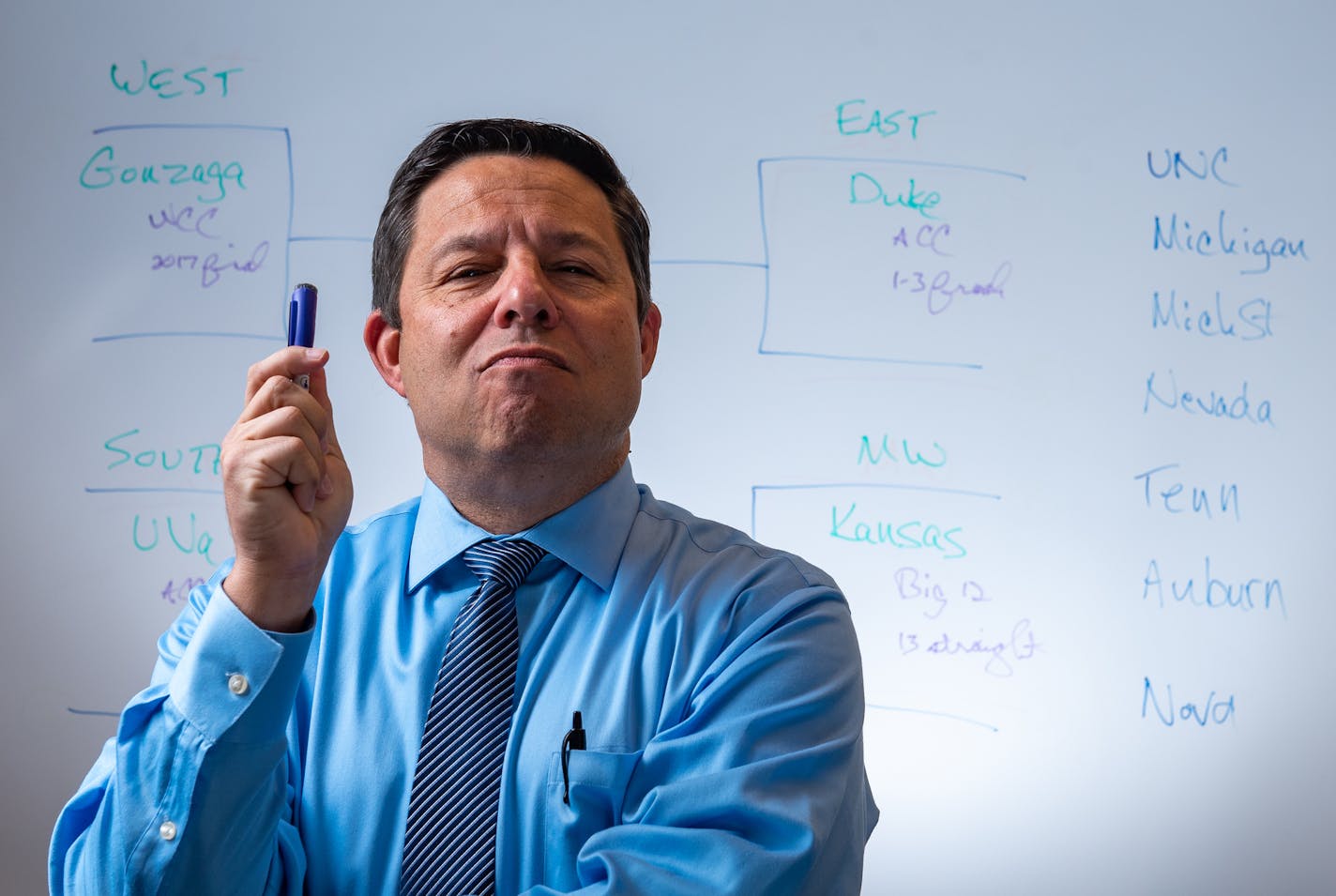 Joe Lunardi, ESPN commentator and creator of "Bracketology," stands with his championship predictions on Wednesday, November 28, 2018. (Kriston Jae Bethel for the Star Tribune)