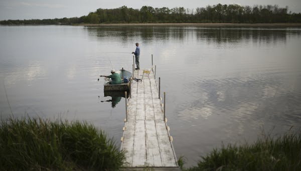 Guests at Lakecrest Resort on Long Lake fished off one of the docks. Amy Wolf and her husband, Kregg, bought the Detroit Lakes resort in January and h