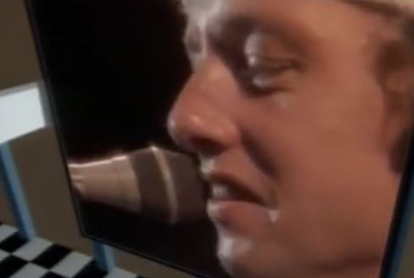 Mark Knopfler of Dire Straits, in the band's music video for "Money for Nothing."