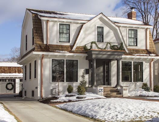 The home in Edina's historic Country Club district still has a traditional Dutch Colonial facade. But everything changes when you look at the back.