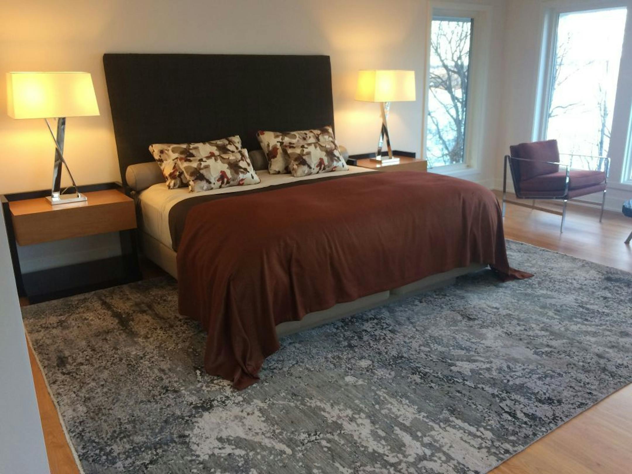 The owners' bedroom has view of Stubbs Bay in #258 Dream Home in Orono.