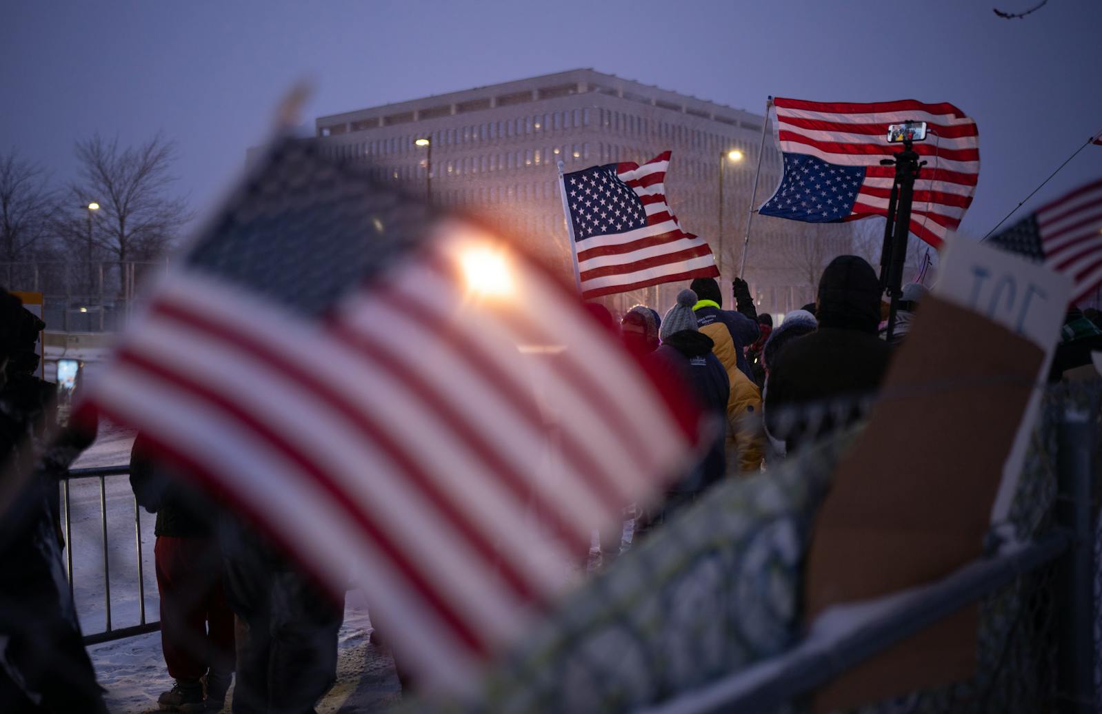 Anti-ICE demonstrators across the street from the Whipple Federal Building at Fort Snelling in Minneapolis on Sunday, Jan. 18.