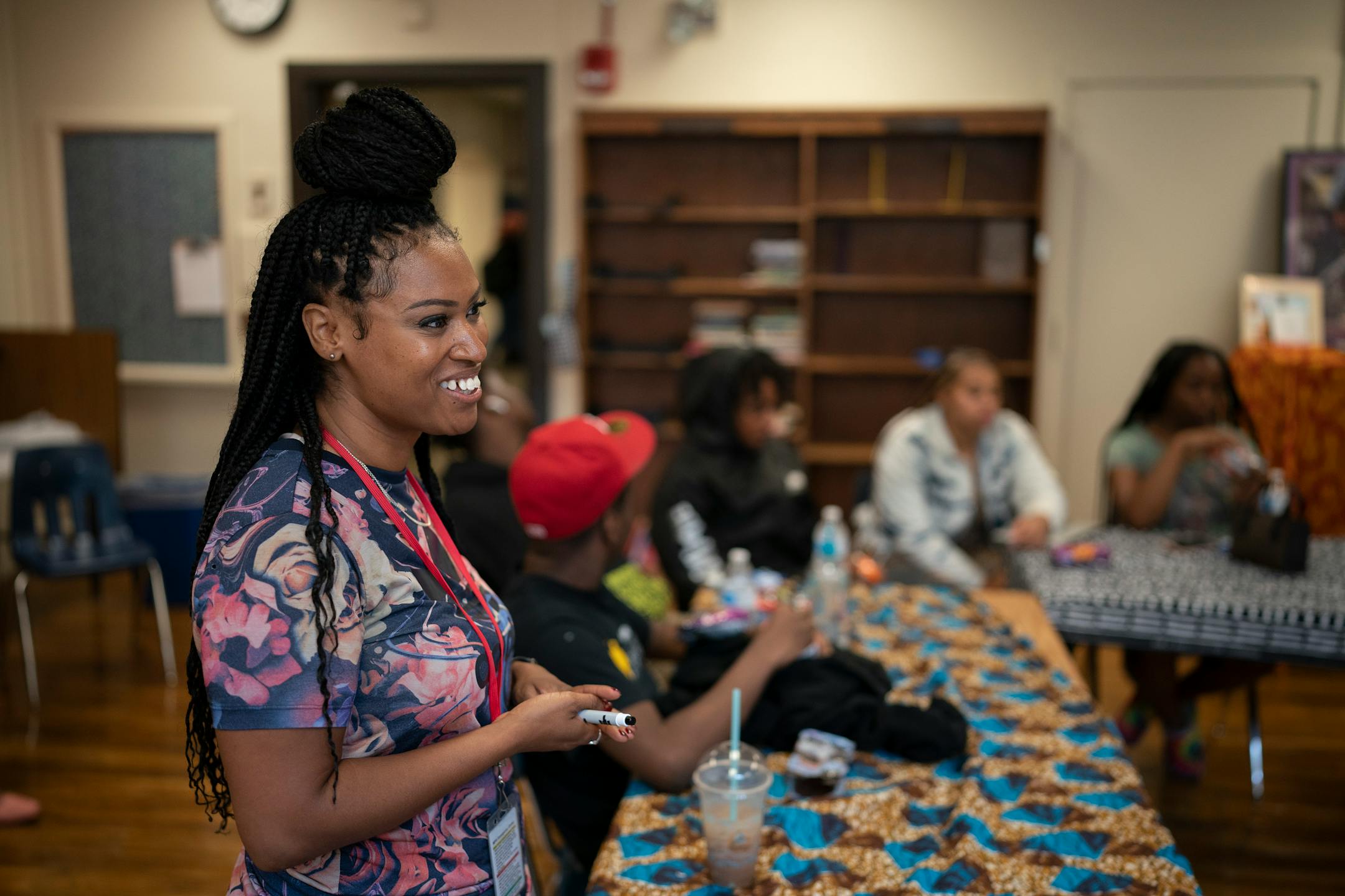 English teacher Nafeesah Muhammad listened too Black Storytellers Vusumuzi Zulu and his wife Nothando Zulu as they spoke to a morning English class at Edison High School.