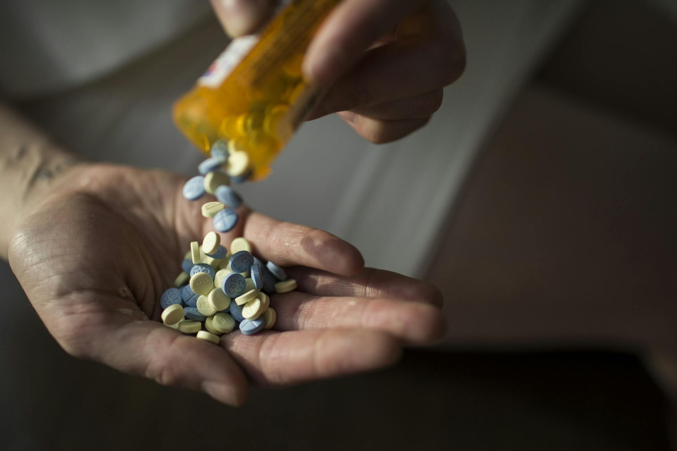 Elizabeth, a Long Island native in her late 20s, with the Adderall pills she considers a necessity to keep pace with her peers. Interviews with users and treatment experts suggest a growing number of young American workers are taking stimulants to enhance concentration and stamina at work.