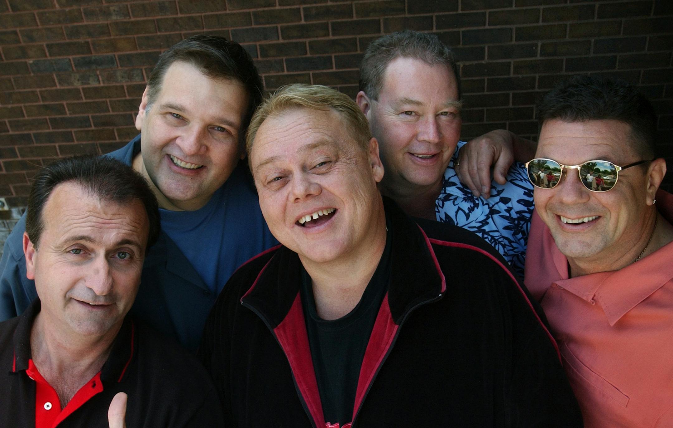 Wayzata,Mn.,Thurs.,June 17, 2004—Minneapolis comedians (Left to right) Jeff Gerbino, Scott Hansen, Louie Anderson, Bill Bauer and Alex Cole pose for a reunion photo.