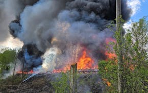 Two structures south of County Road I and Fairview Avenue became engulfed in flames Saturday, May 10, 2025.