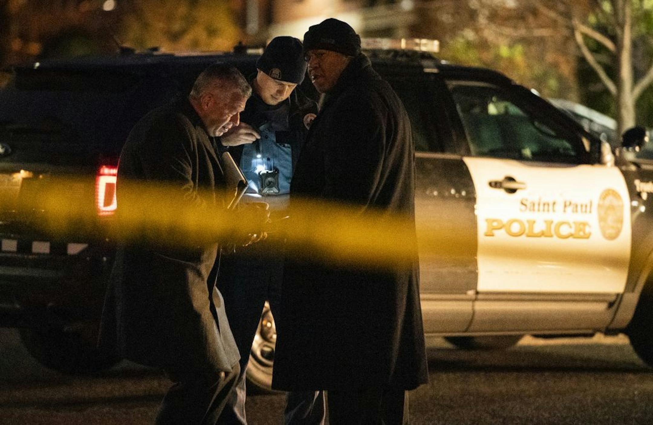 St. Paul Police investigators on the scene of a shooting in the Highland Park neighborhood.