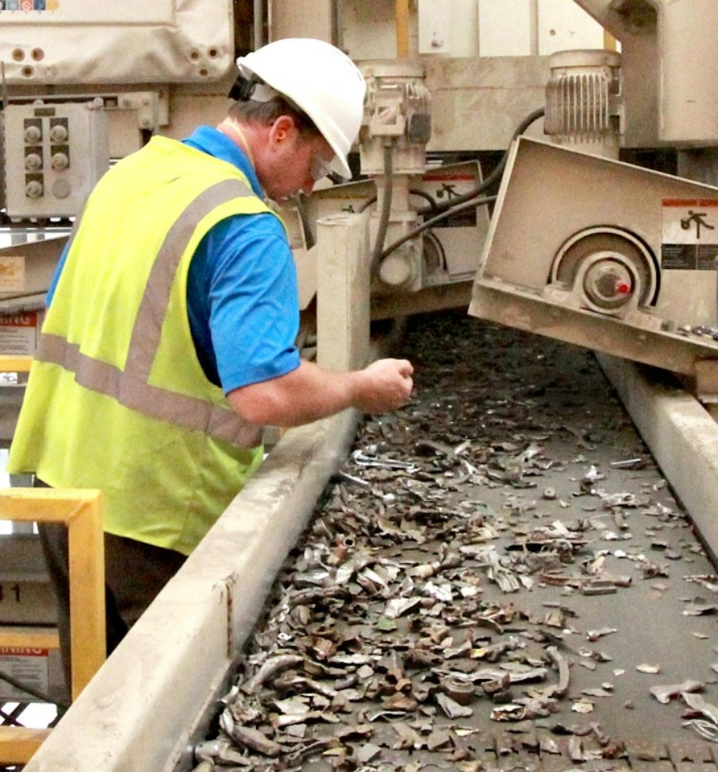 Spectro Alloys regional sales manager Alan Gergen checks on one of the Rosemount factory's lines. (Provided photo)