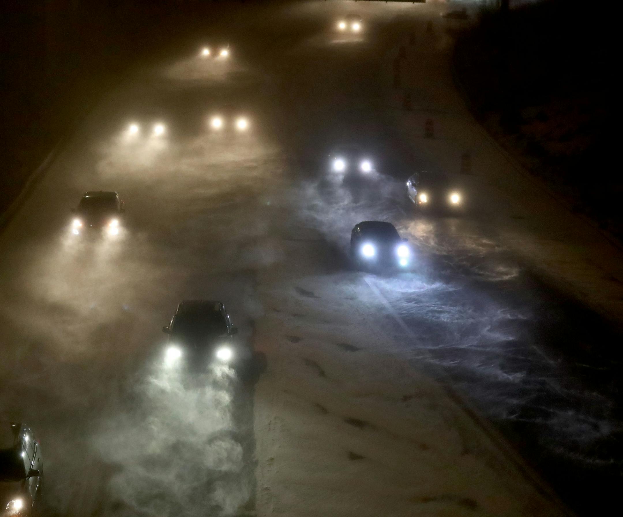 Snow and wind during the early morning commute slowed things down for motorists, along I-35W, seen from the 24th St. foot bridge Thursday, Dec. 28, 2017, in Minneapolis, MN.
