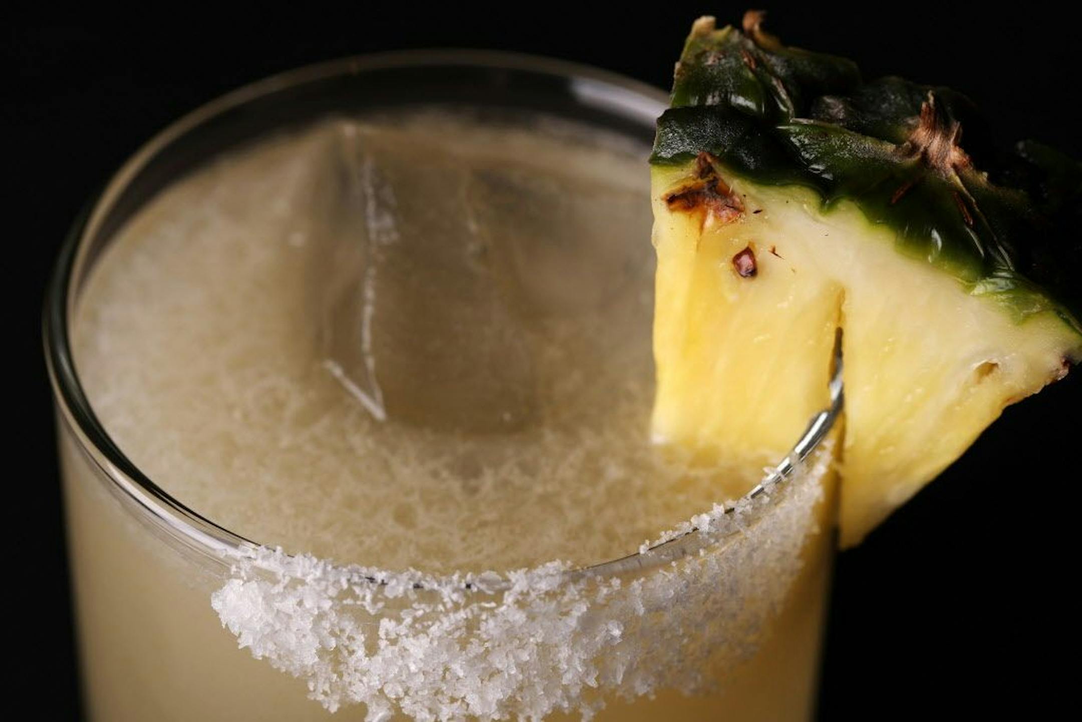 Pictured is the Kaena Point, a margarita with pineapple, lime, honey and habanero.